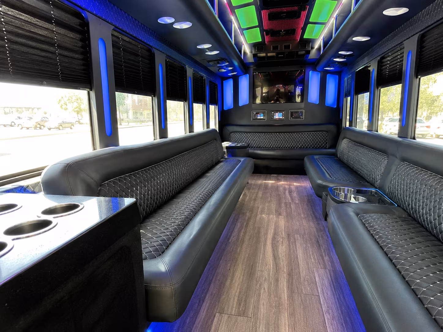 Friends laughing during a party bus celebration in Orlando