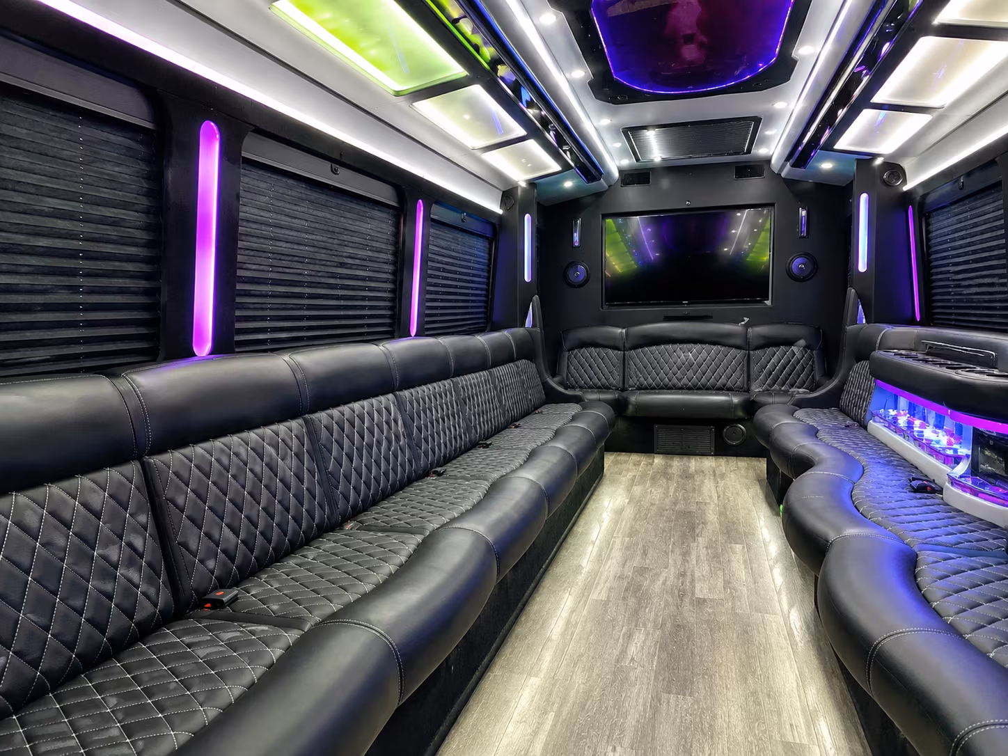 Group beside a Mercedes Sprinter limo in Orlando